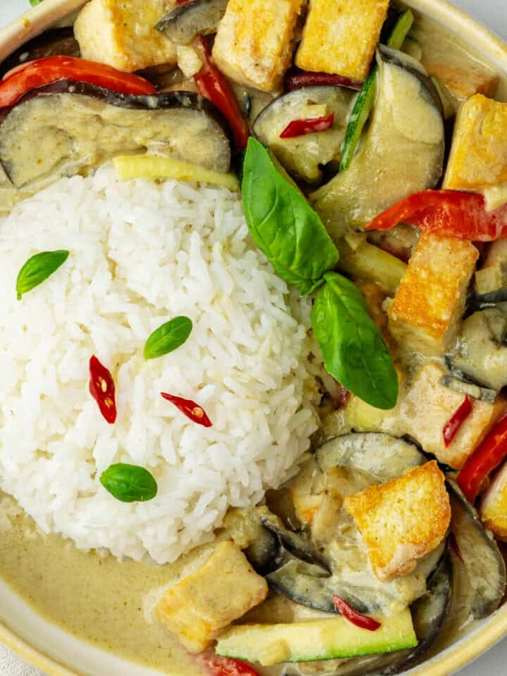 Bowl of thai green curry with jasmine rice