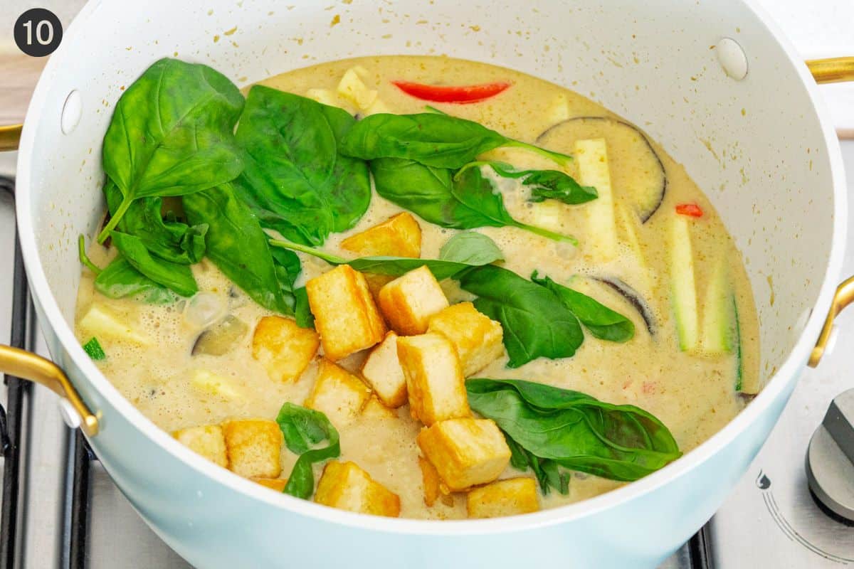 basil and tofu added in to finish the curry