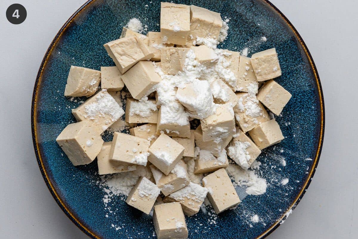 Tofu cut in pieces and coated in corn starch