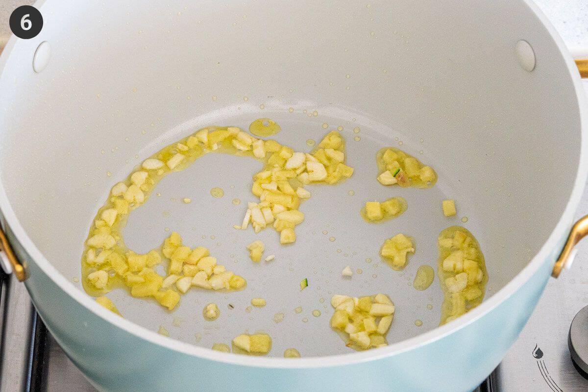 garlic being sautéed with olive oil