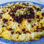 Zereshk Polo served with barberries, almonds and pistachios