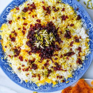 Zereshk Polo served with barberries, almonds and pistachios