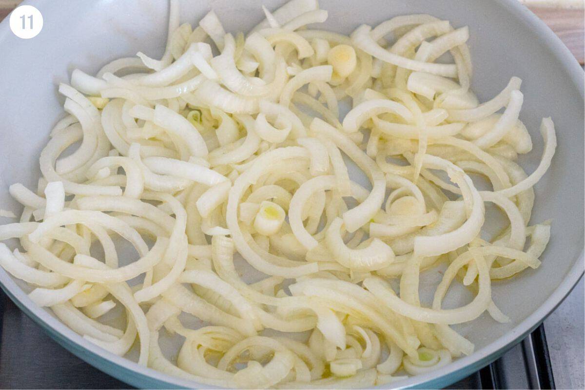 Onions being sautéed with oil olive