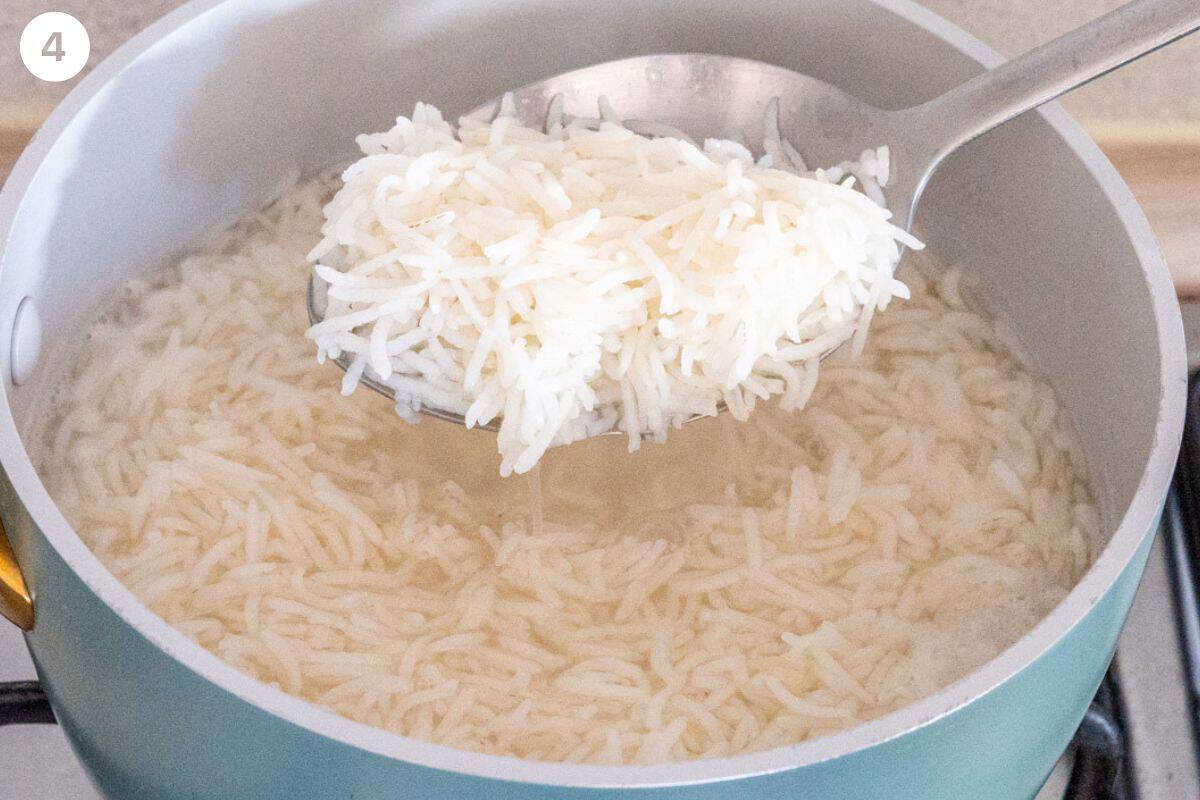 Rice par boiled in a pot