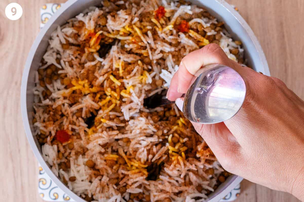 End of spoon making air pockets in the pot of rice