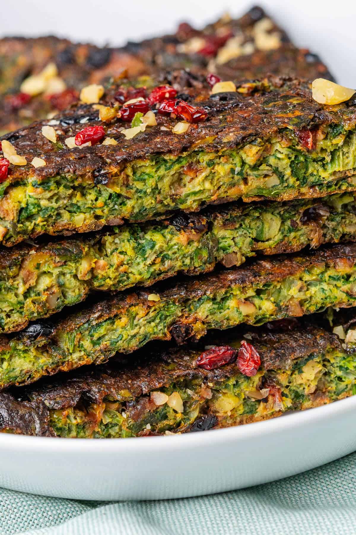 Close up of stack of Kuku Sabzi