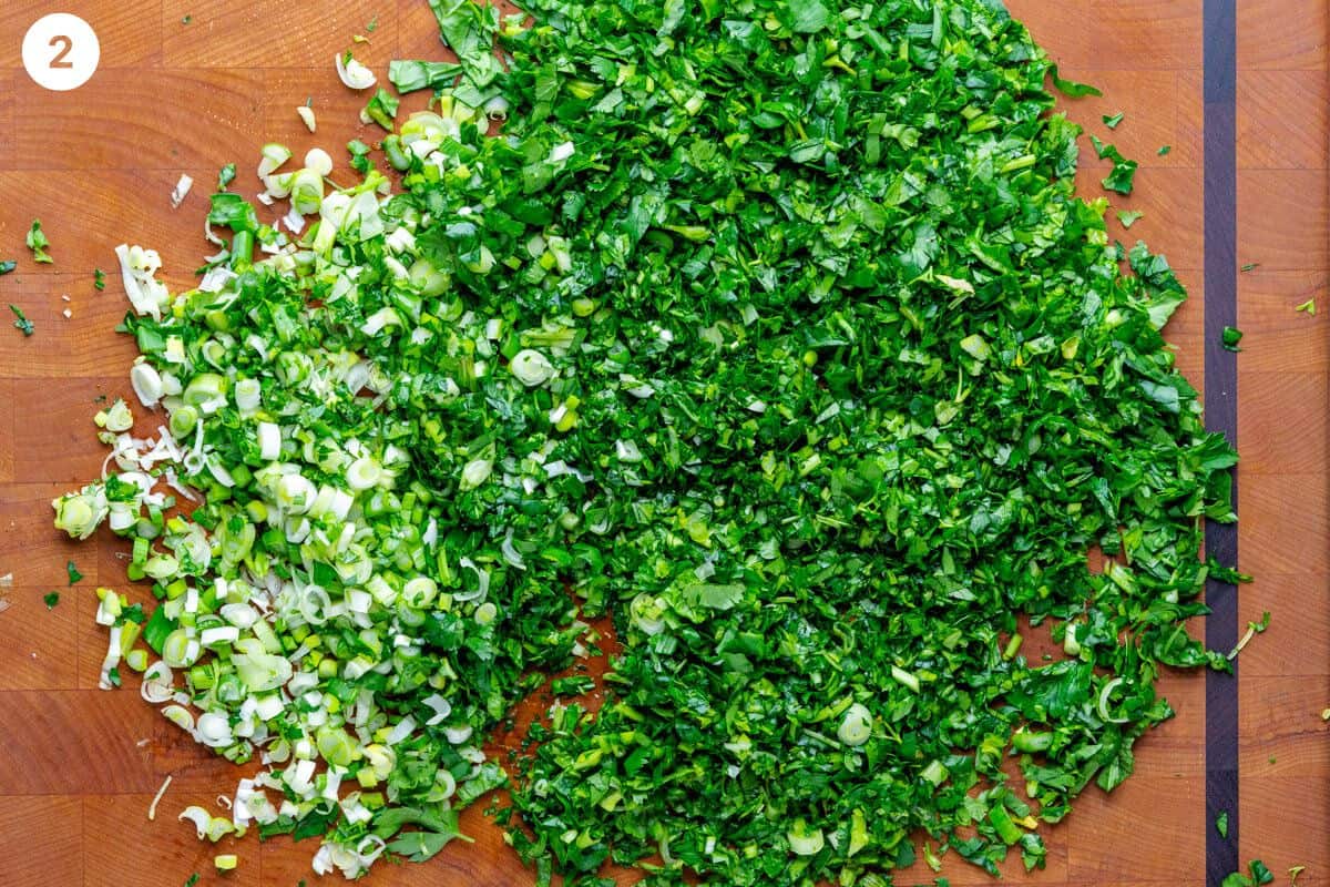 Fresh greens chopped on a cutting board