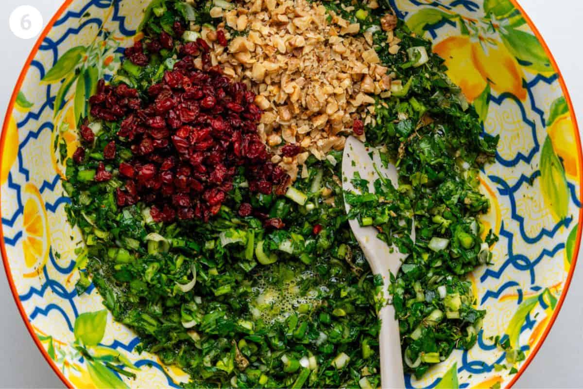 Greens, barberries and walnuts added to egg mixture