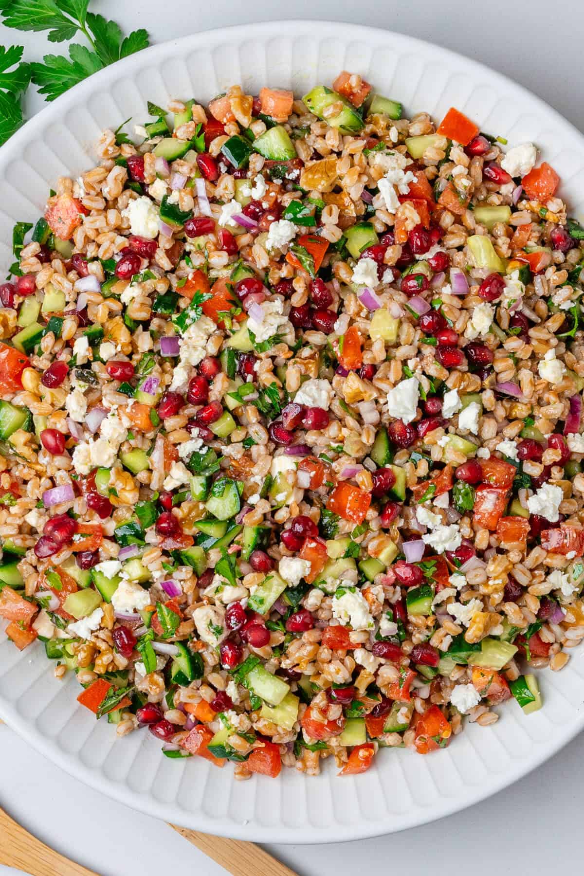 Farro salad with fresh veggies, pomegranate and feta cheese