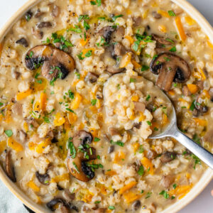 Mushroom barley soup in a bowl with a soup