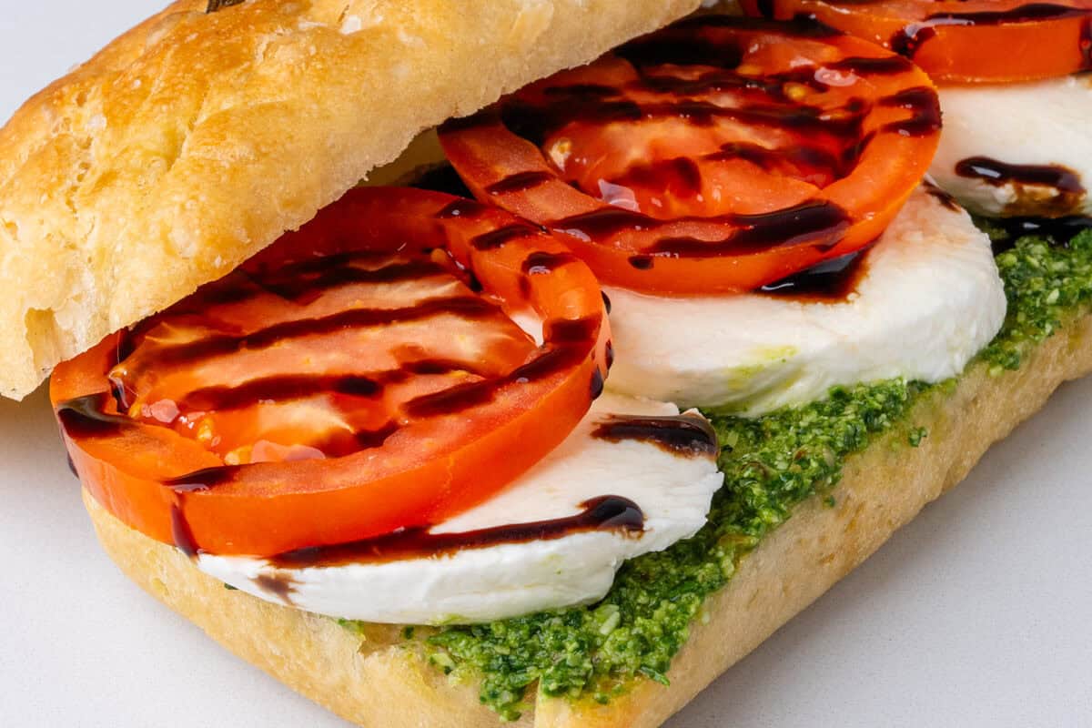 Caprese sandwich with pesto, mozzarella and tomato