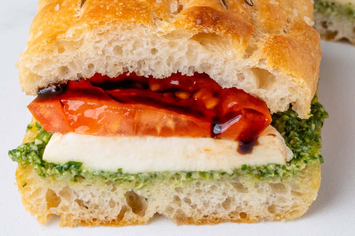 Caprese sandwich cut in half to show the inside