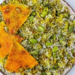 Baghali Polo with crispy tahdig on the side