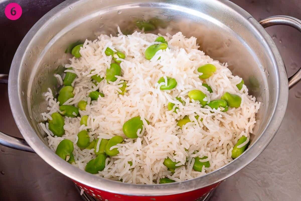 Rice and broad beans drained once par boiled