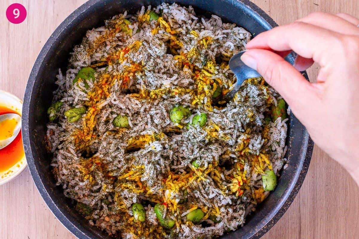 Air pockets being made into rice with the back of a spoon