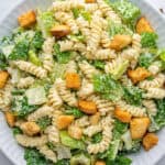 Caesar pasta salad in a bowl with croutons