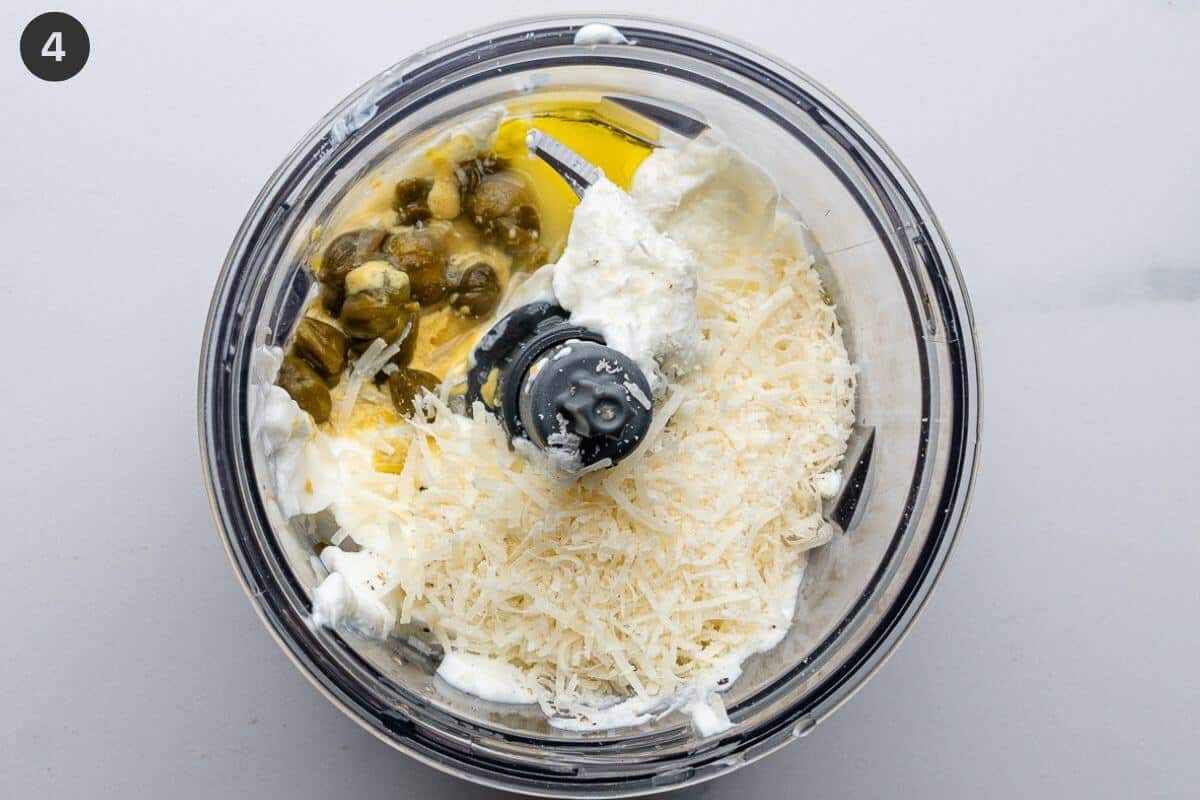 Caesar salad dressing added to a blender