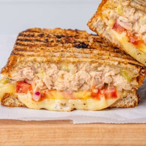 Tuna melt sandwich with melted cheese and tomato