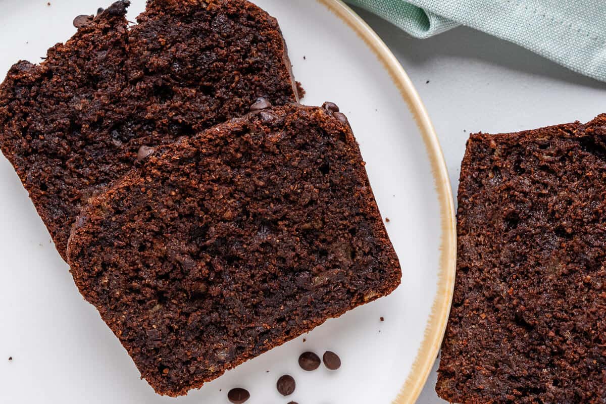 Two slices of chocolate banana bread on a plate