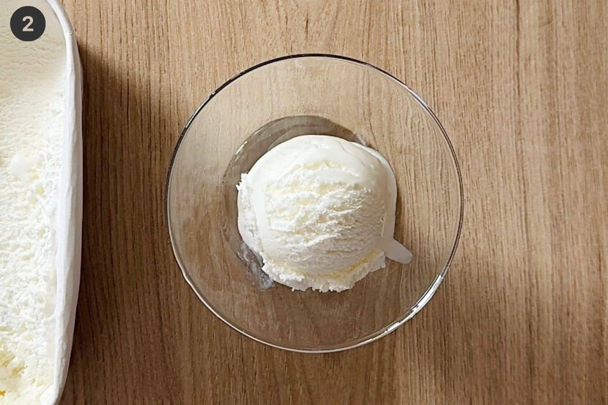 Glass cup chilled with ice cream added