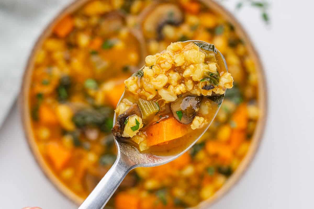 Close up of spoon to show soup texture