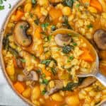 Spoon in a bowl of Barley Soup