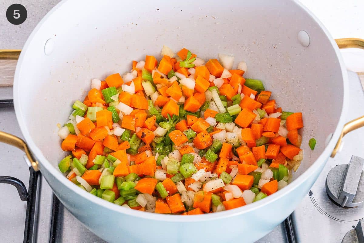 Carrots, onions, celery being sautéed