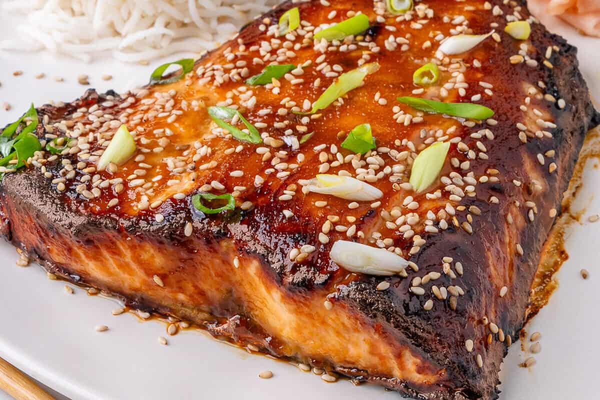 Miso salmon fillet topped with sesame seeds and green onions