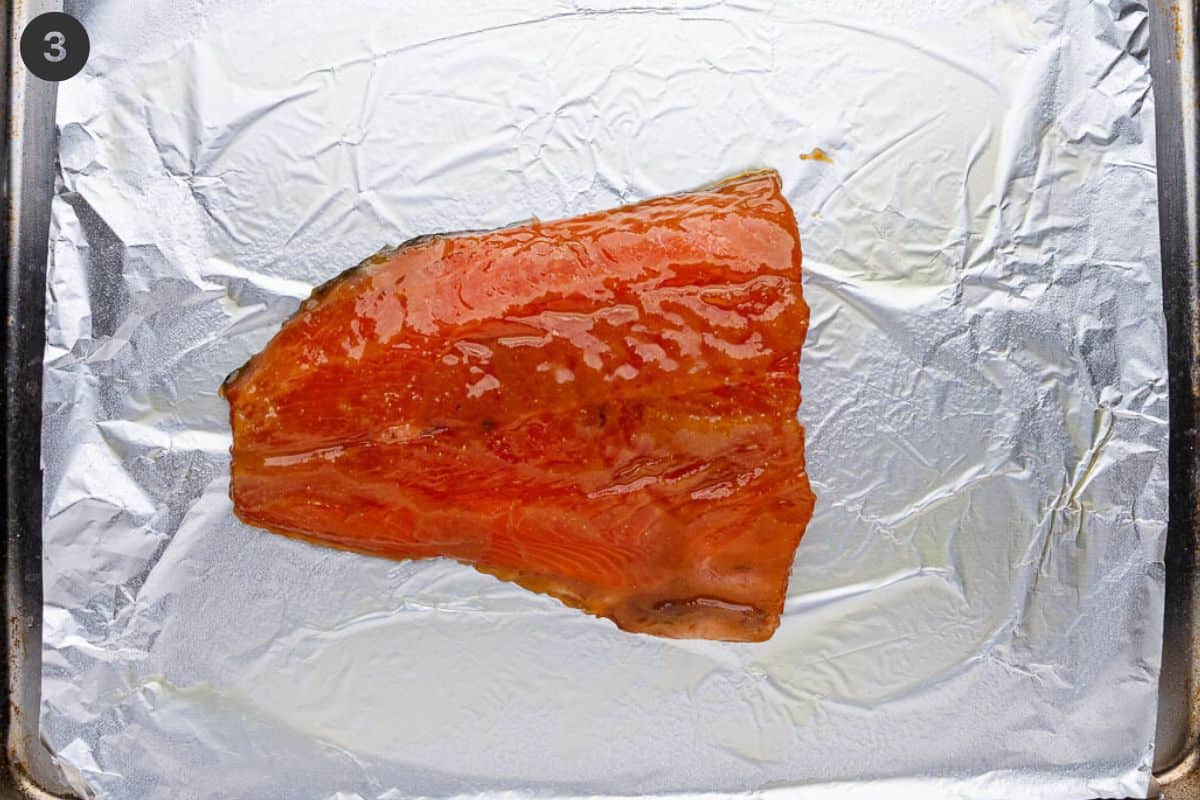 Salmon fillet placed on a oven tray lined with foil