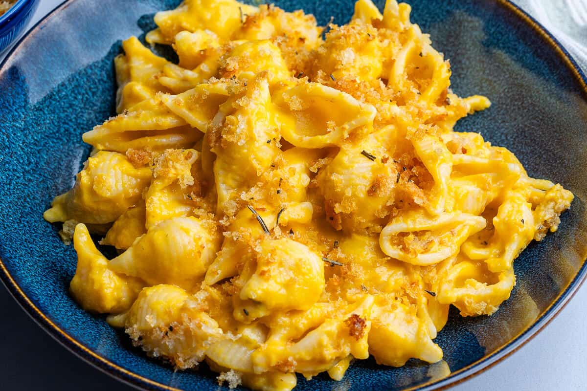 Butternut squash pasta served in a bowl topped with pangrattato