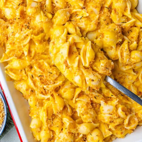 Spoon in a tray of butternut squash pasta