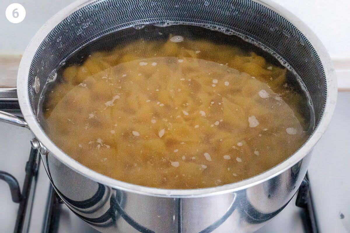 Pasta being cooked in a pot