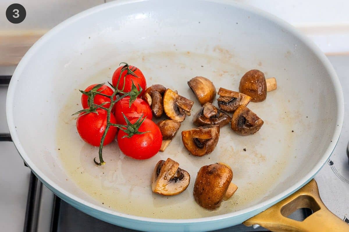 Cherry tomatoes added to the pan