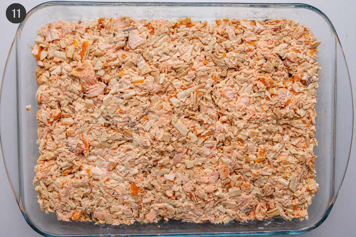 Salmon mixture added on top and flattened