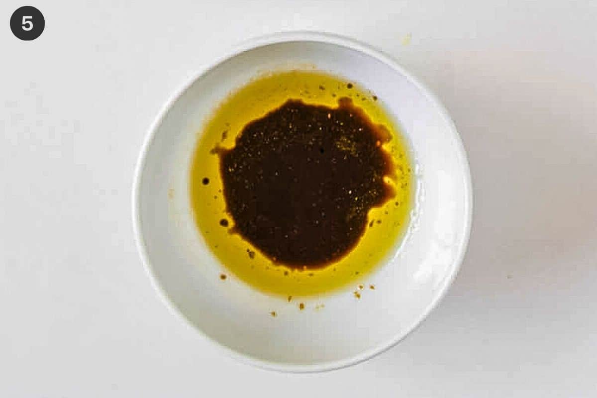 Dressing added to a small bowl