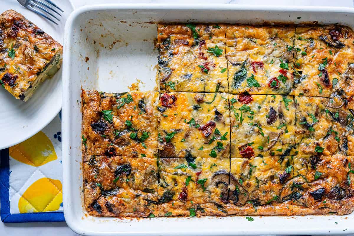 Oven dish of casserole with a piece missing