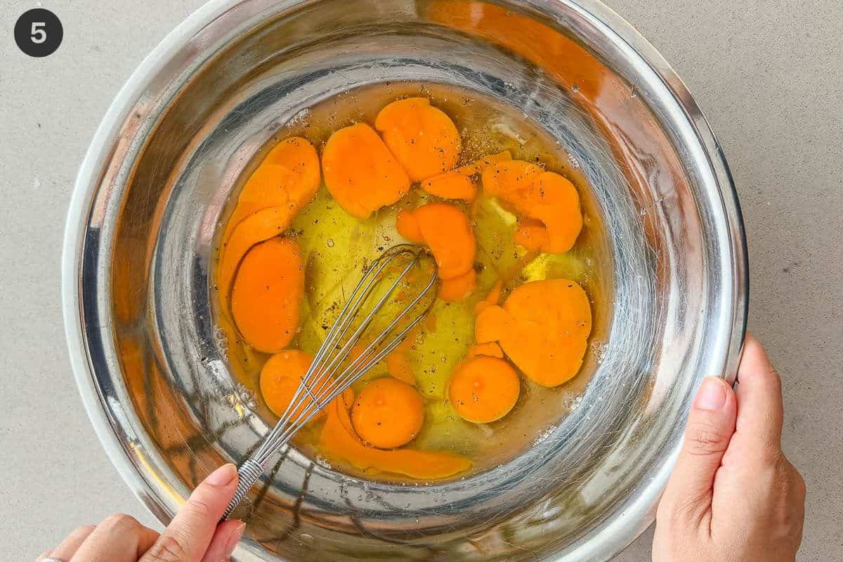 Eggs being whisked in a large bowl