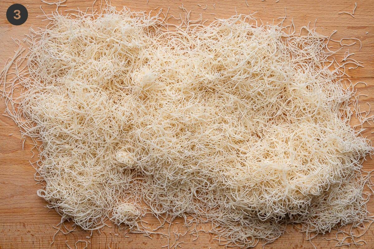 kataifi chopped and separated on a cutting board