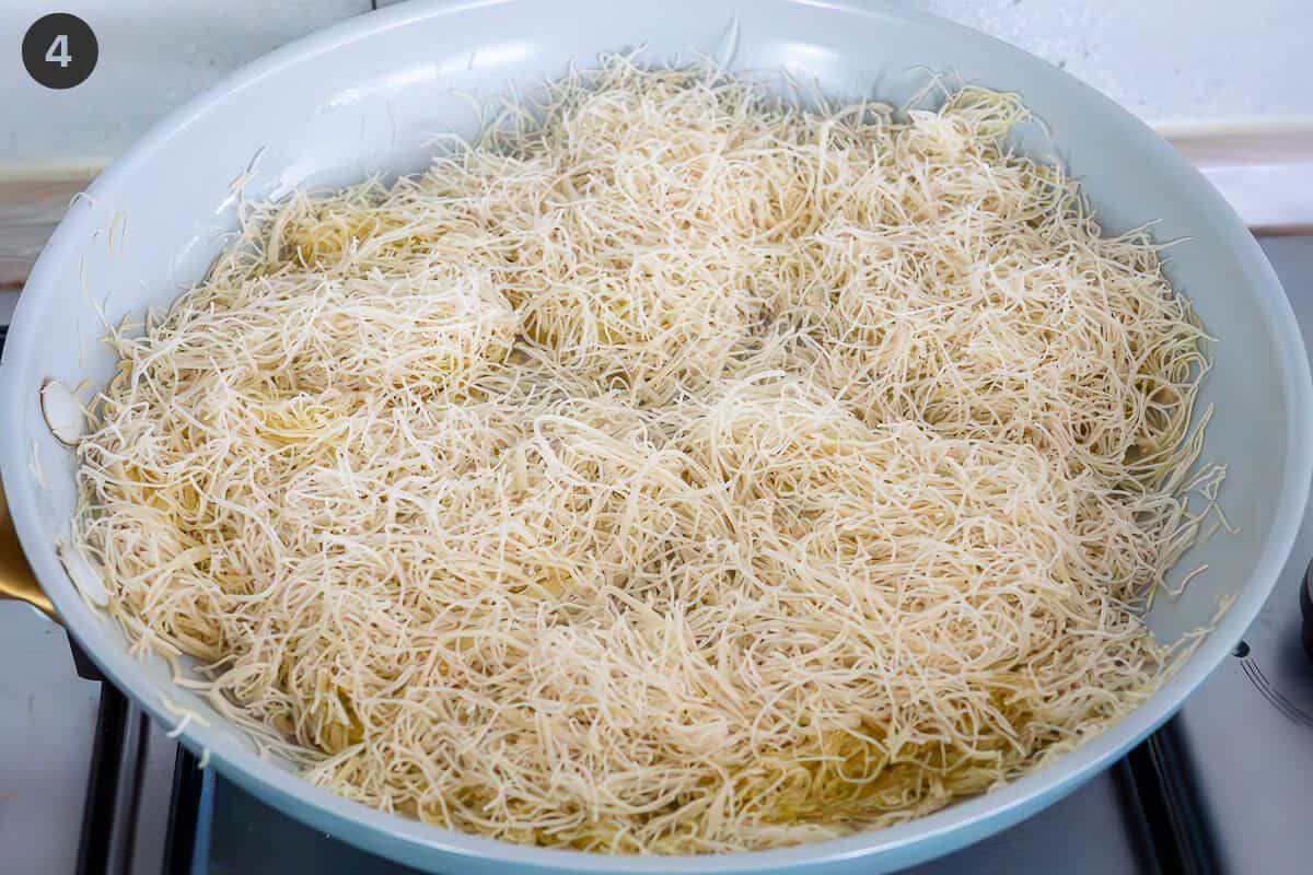 Kataifi being toasted in a pan with olive oil