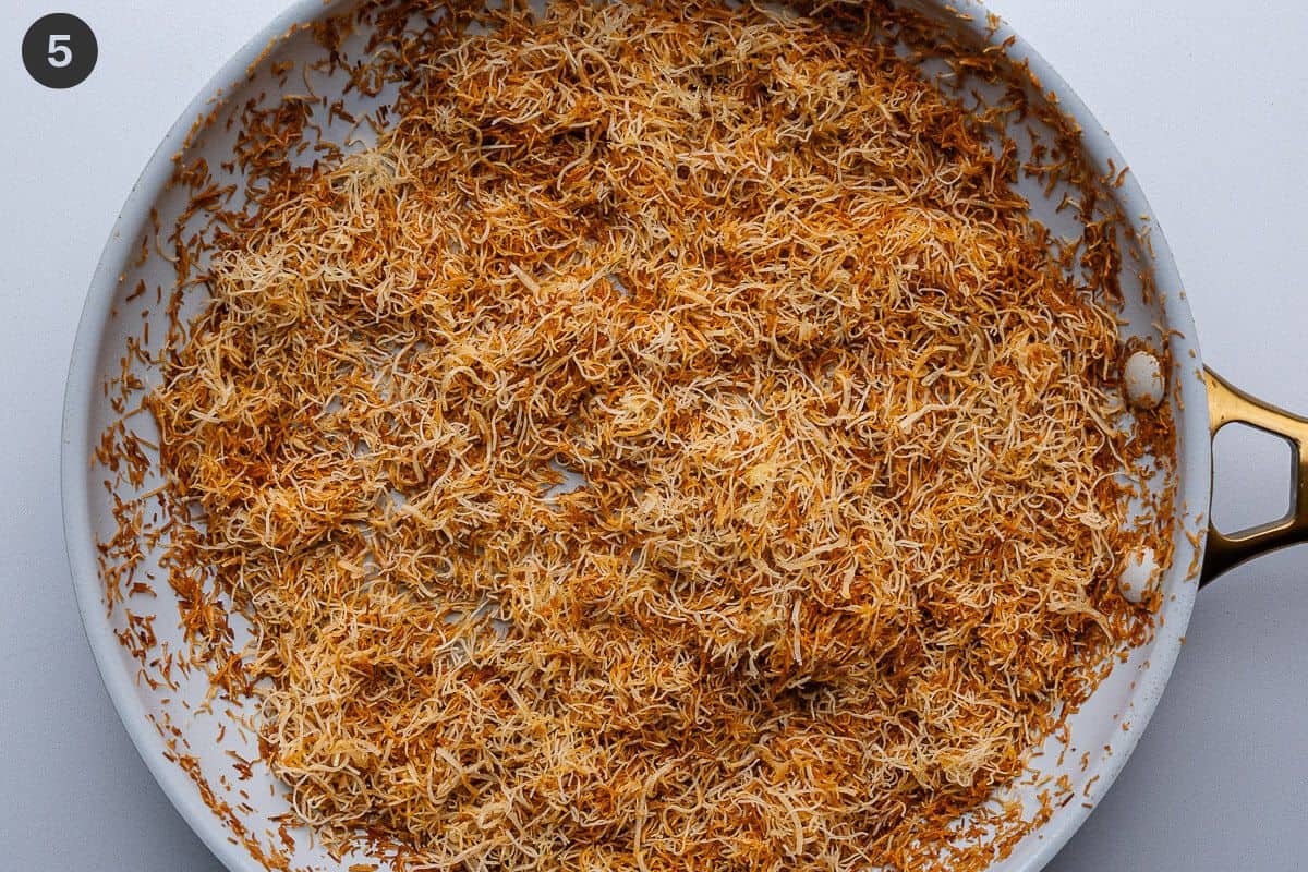 Toasted kataifi cooling in the pan