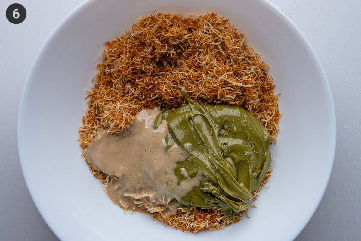 Pistachio spread and tahini add to the toasted kataifi in a bowl