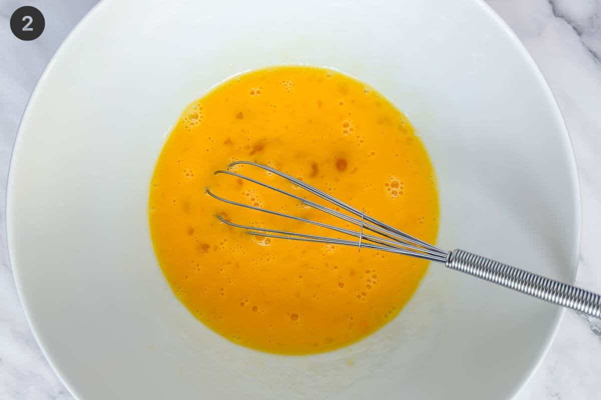 Eggs whisked in a large bowl