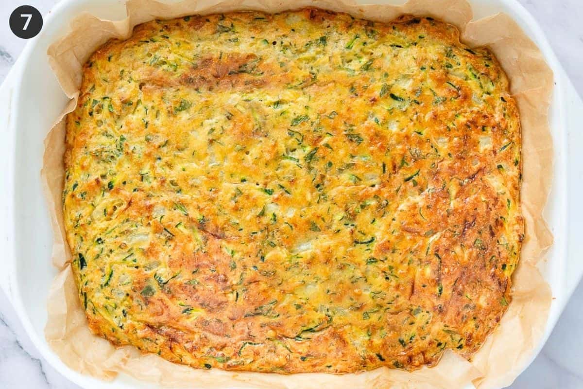 Zucchini slice baked and cooling in the oven tray