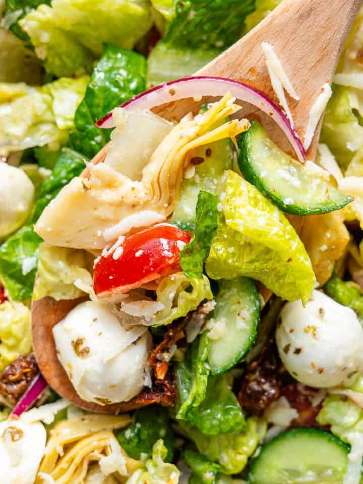 Italian Chopped Salad with spoon coming out of a bowl
