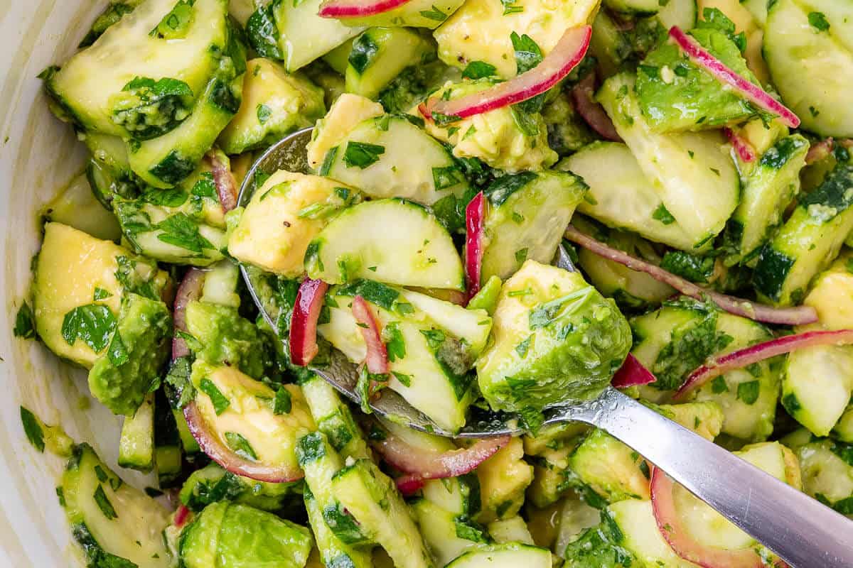 Avocado Salad with spoon coming out of bowl