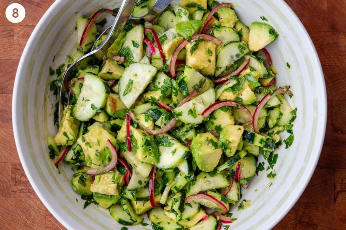 Lastly avocado added to the salad bowl and mixed in