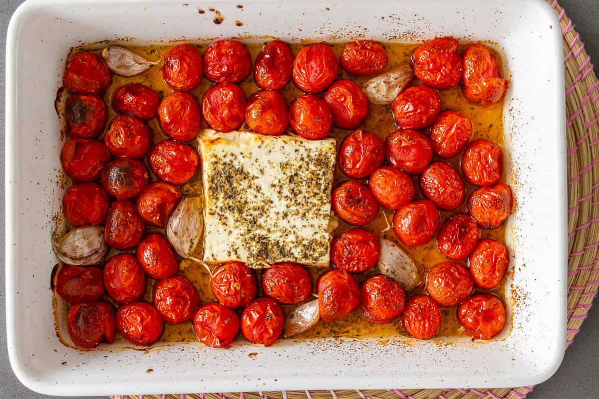 Roasted cherry tomatoes, feta and garlic roasted in an oven tray