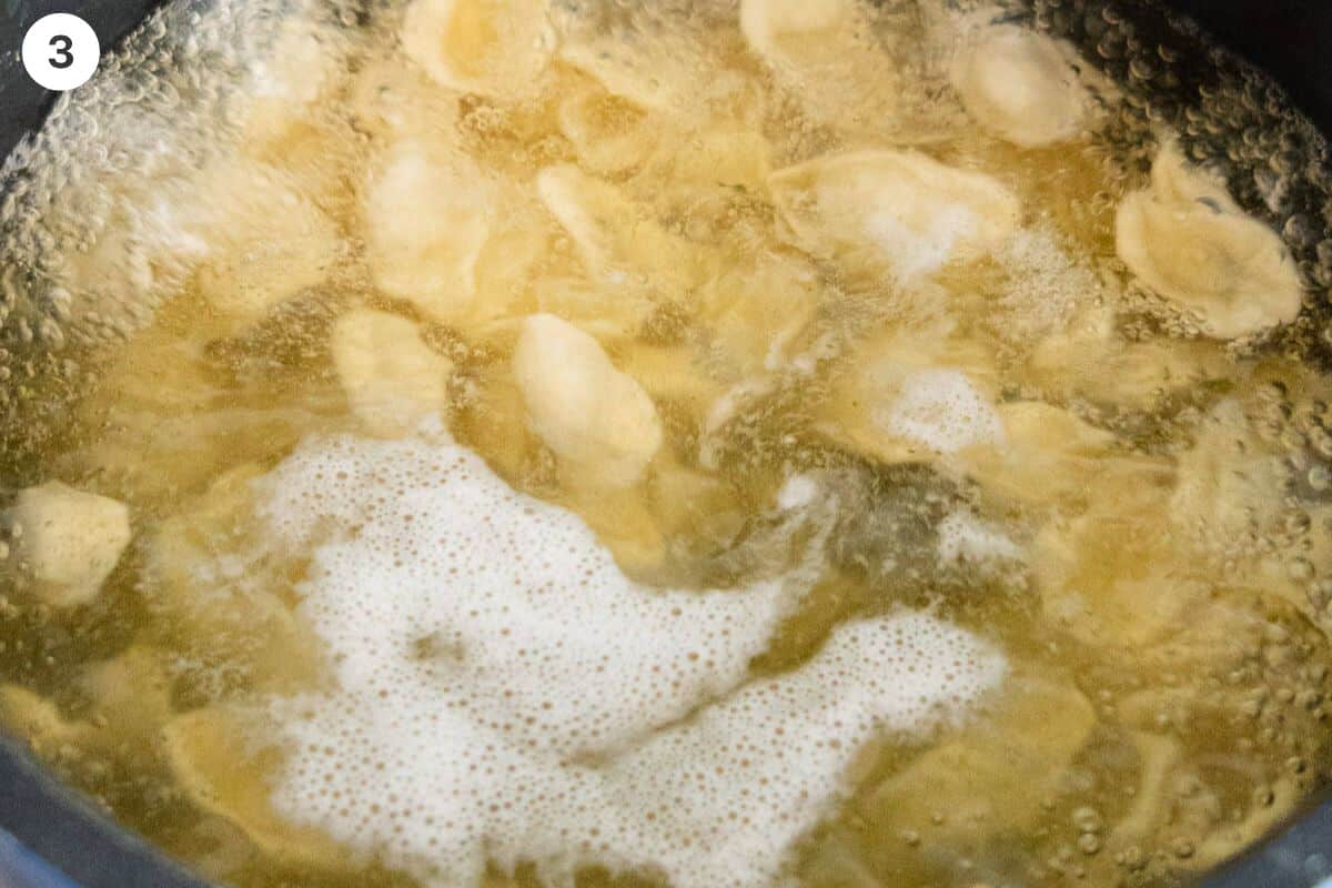 Pasta being cooked in boiling water