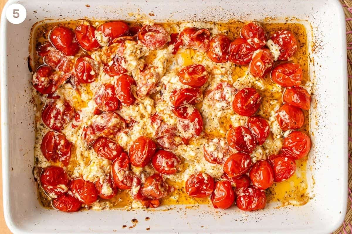 Feta cheese broken up and mixed with the cherry tomatoes and garlic
