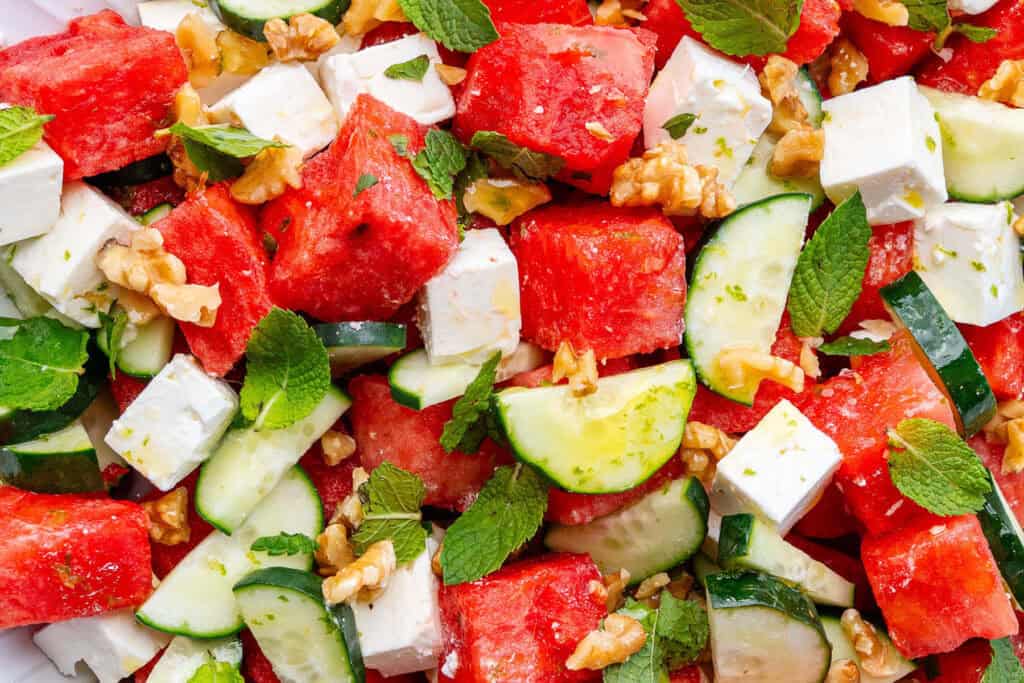 Watermelon Feta Salad with dressing just placed on top